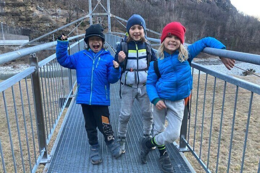 Family rock climbing near Locarno