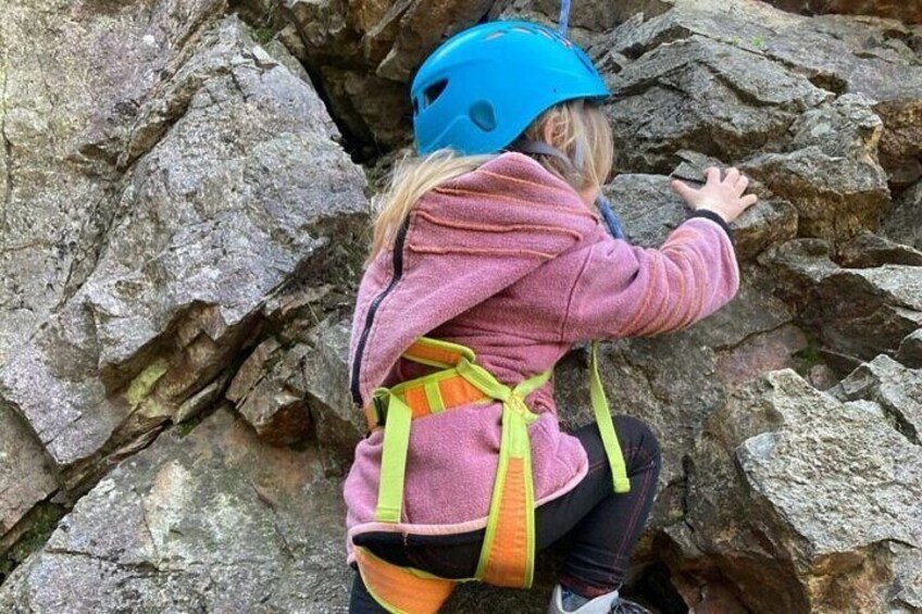 Family rock climbing near Locarno