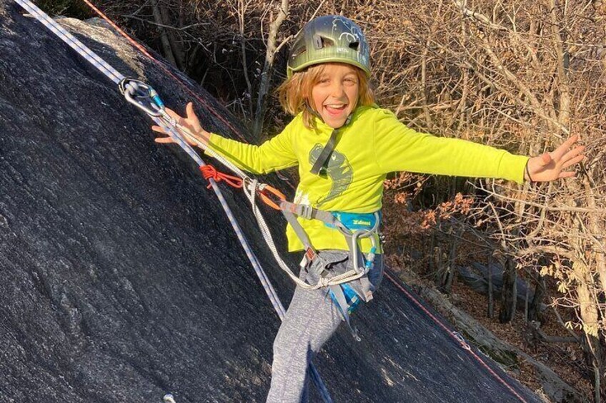 Family rock climbing near Locarno