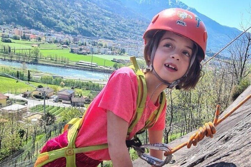 Family rock climbing near Locarno