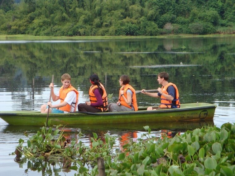 Group on a boat ride on the Bau Sau (Crocodile Lake)