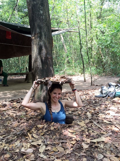 Woman visiting the Cu Chi Tunnels
