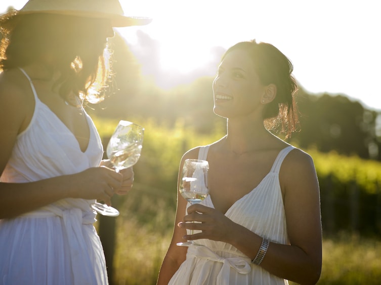 Women drinking wine at a vineyard in Hunter Valley