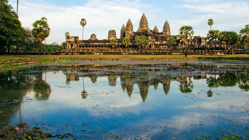 Angkor Wat temple and its reflection on water in Cambodia