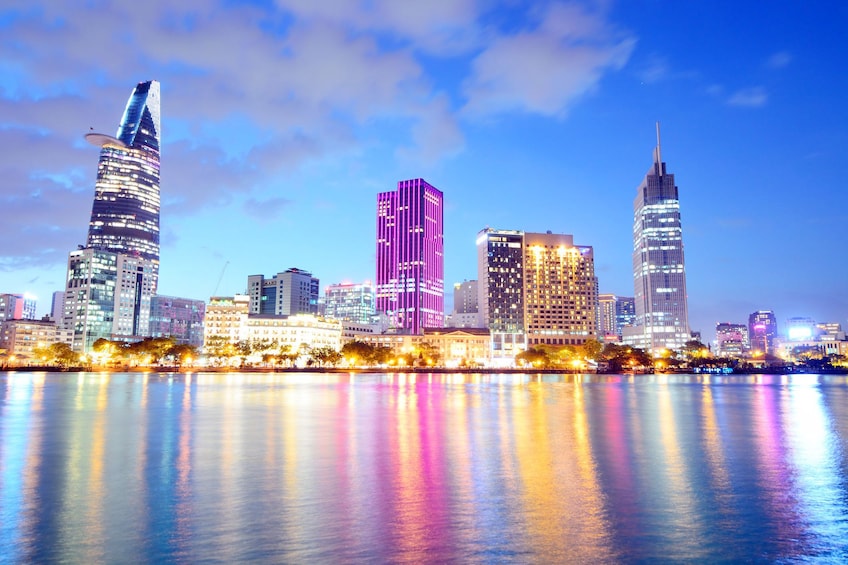 Colorful skyline and its reflection on water in Ho Chi Minh City