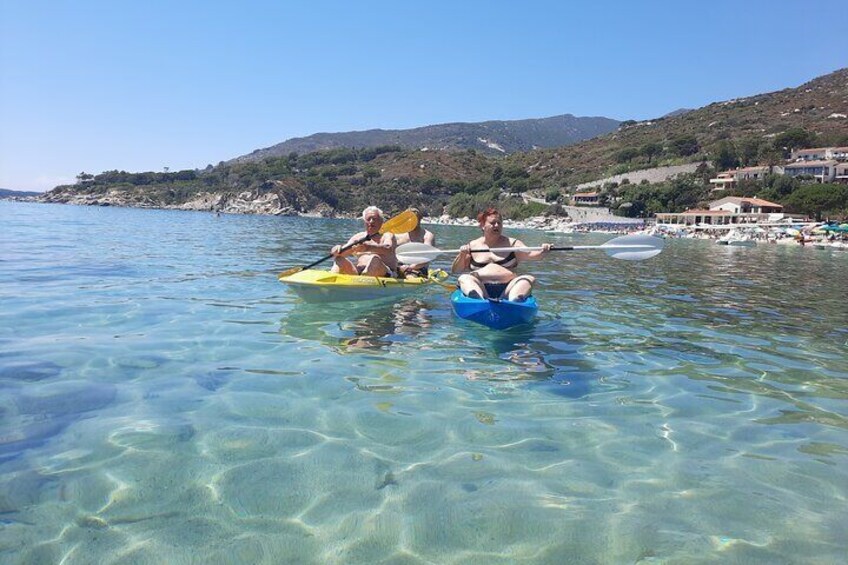 Canoe excursion in the crystalline sea of Elba Island