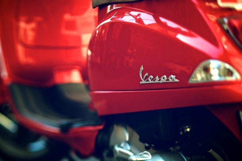 Close up of a red Vespa 