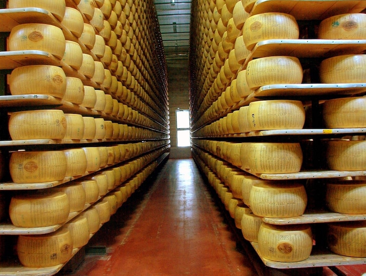 Show item 2 of 6. Storage area for wheels of Parmesan cheese