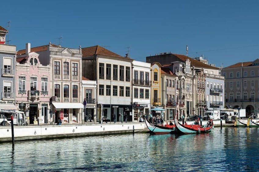 Aveiro Moments: Moliceiro Boat Tour through the Ria de Aveiro.