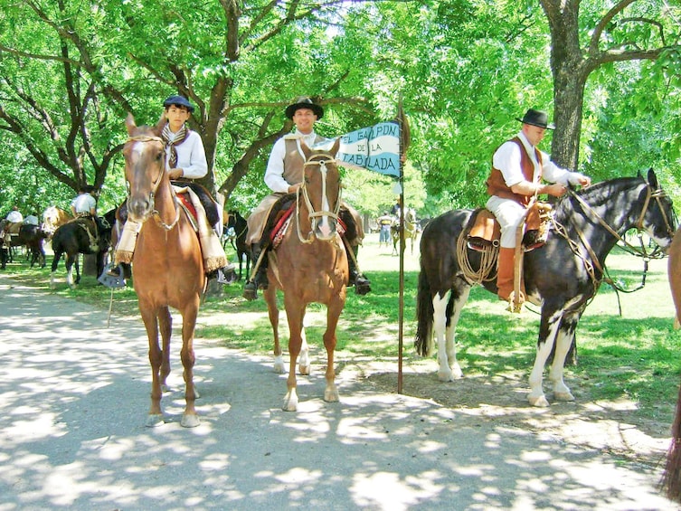 Men riding horses in Buenos Aires