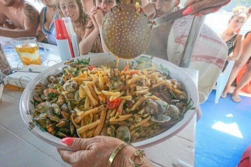 Casarecce with seafood. Our lunch on board is part of the Neapolitan tradition with a careful selection of typical Campania products.