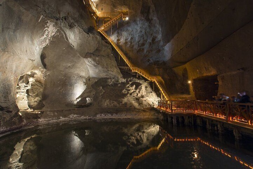 Underground lake and wooden stairs - Wieliczka Salt Mine