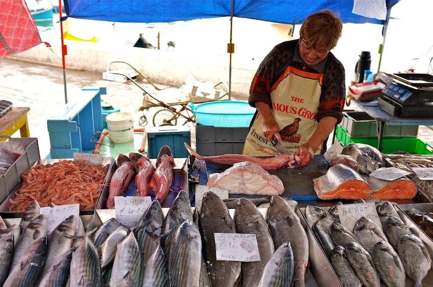 Fish monger iat a market
