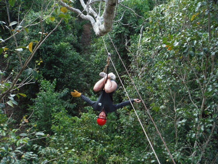 Ziplining man in Cancun