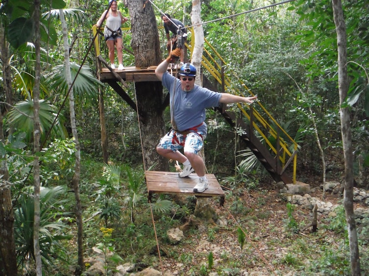 Show item 3 of 10. Man on a ropes course in Cancun