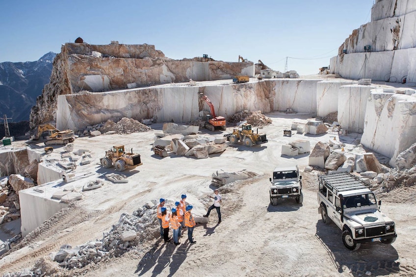 Tour group at marble excavation site in Carrara