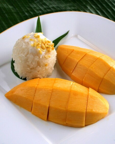 Mango and sticky rice served at the Mandarin Oriental Hotel Dinner and Show in Bangkok
