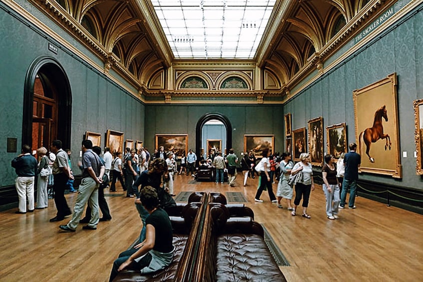 People look on at art in the British Museum