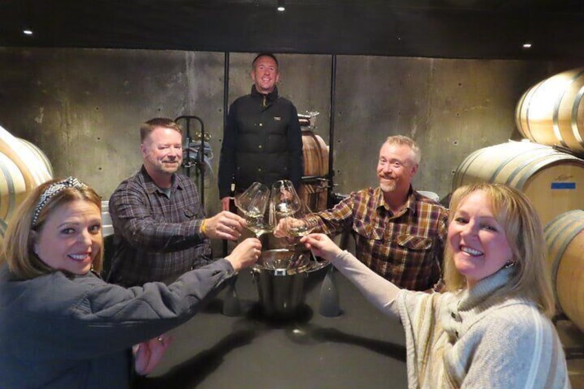 Wine tasting in the cellar. Cheers!