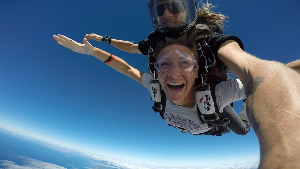 Couple full of excitement on the tandem skydive over Bells Beach, Torquay