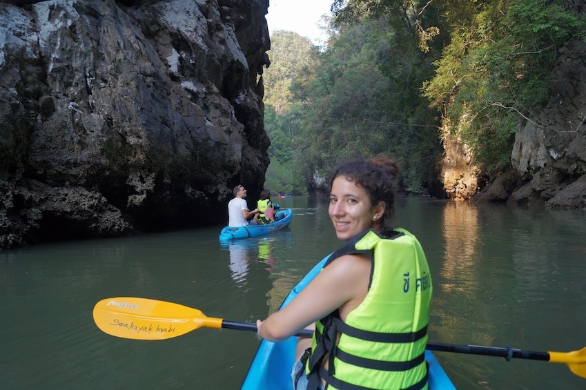 Woman sea kayaking at Ao Thalane Bay