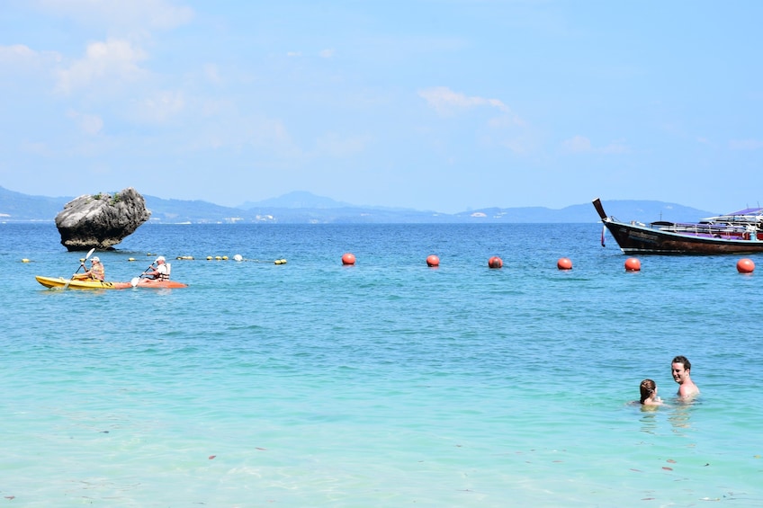 Guests kayaking and swimming at Hong Island, Krasom

