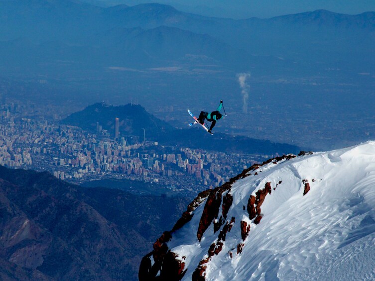 Person making a ski jump in La Parva