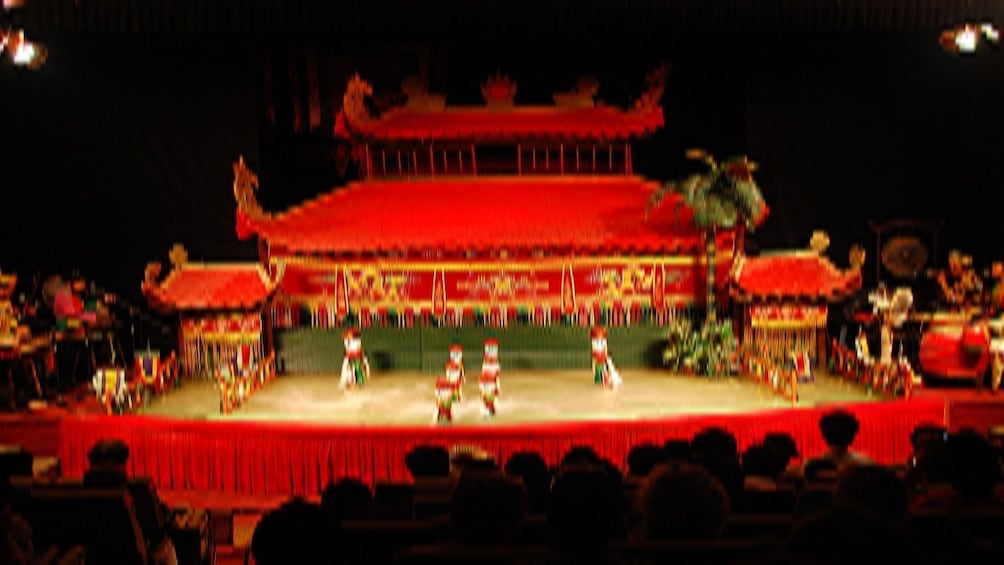 Stage view of the water puppet show on the Saigon River dinner cruise in Ho Chi Minh City
