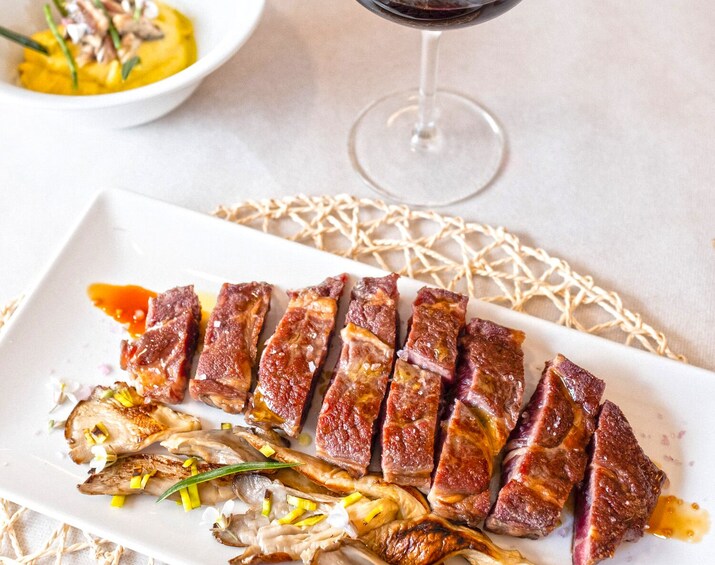 Barrels and dishes of typical local Gastronomy
