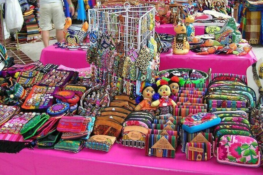 Colorful stalls with handmade crafts and souvenirs at Mercado 28 in Cancun, Mexico.