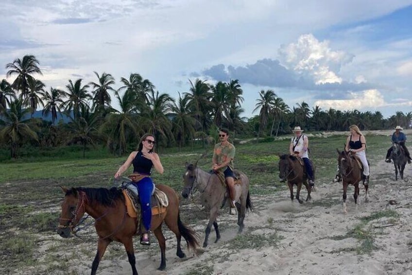 Sunset by horse (river and beach)