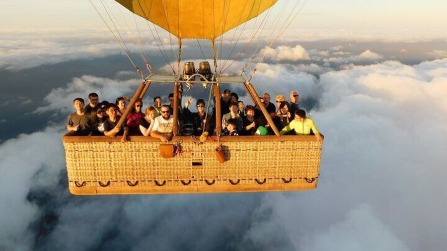 Balloon above the clouds