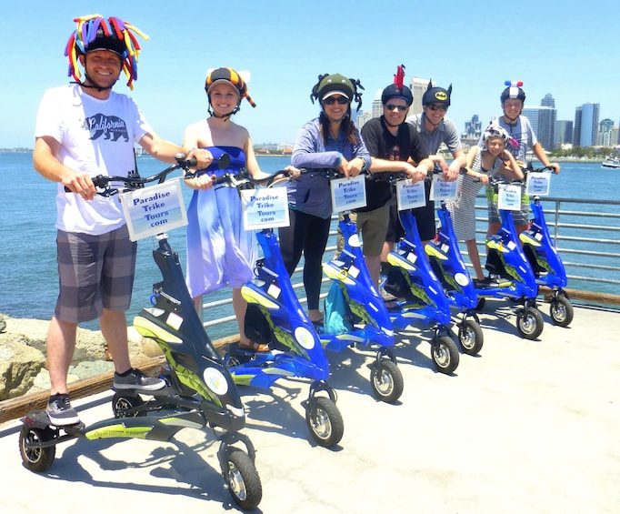 Show item 1 of 5. Group riding trikes in San Diego