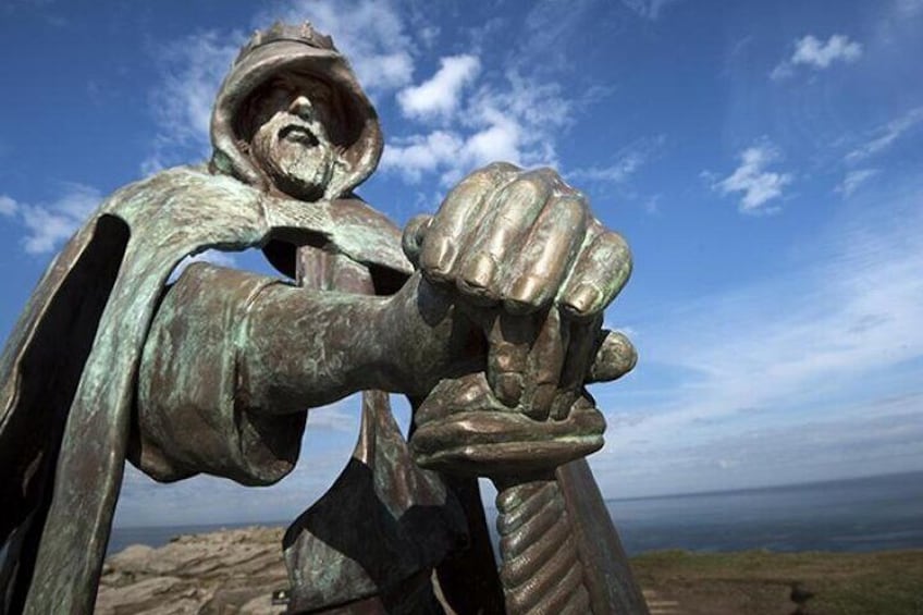 Bronze statue on Tintagel Isle