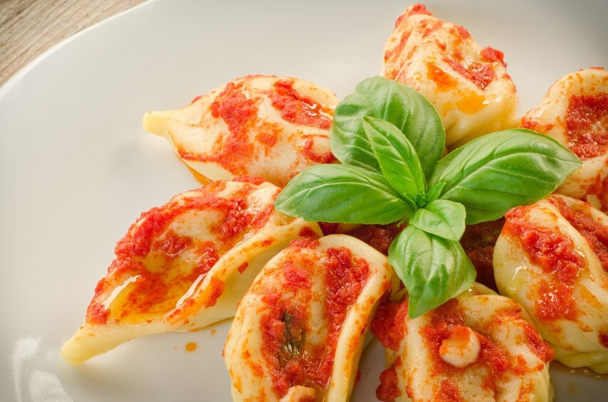 Culurgionis, a Sardinian speciality on a plate in Cagliari