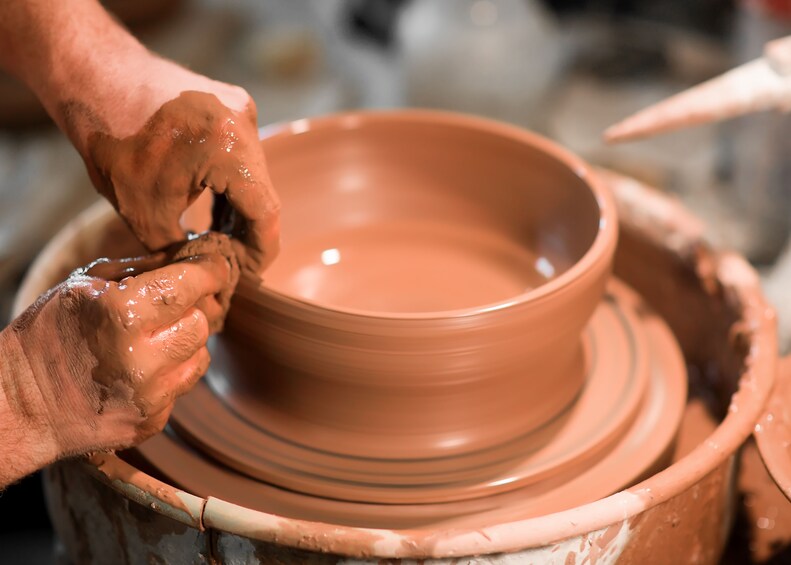 Potter using a potter's wheel in Sicily