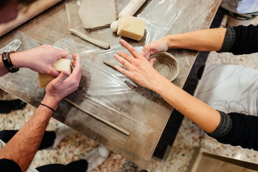 People making pottery in Sicily