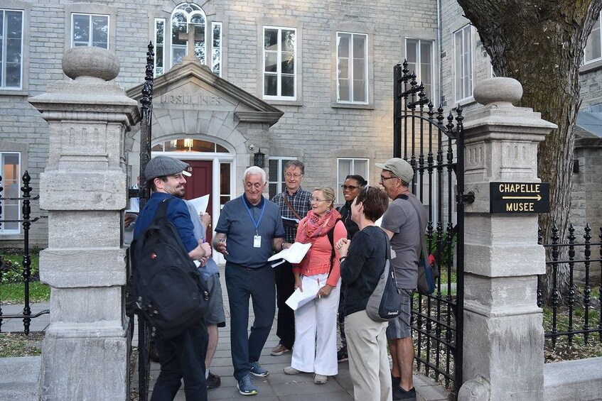 Show item 1 of 6. Tour group with guide in Quebec