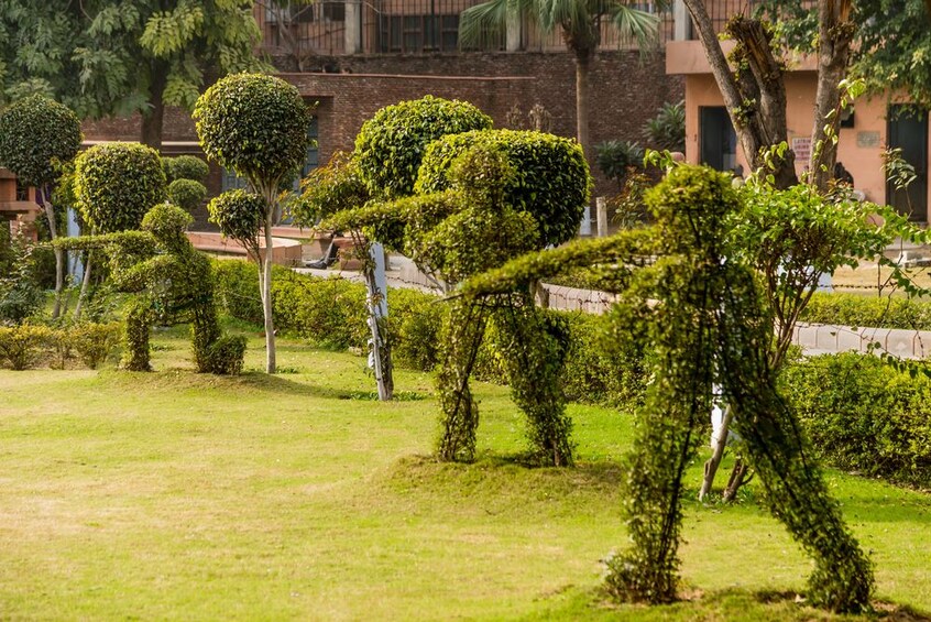 Topiaries of soldiers at Jallianwala Bagh garden in Amritsar
