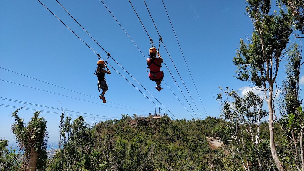 Pair of zipliners in St. Barthelemy