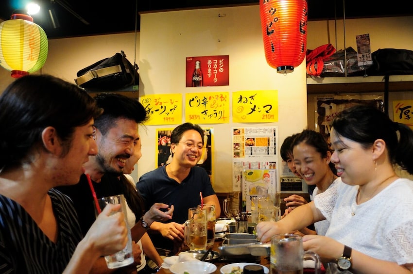 Group happy hour at a Japanese izakaya-style eatery

