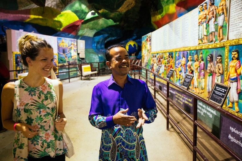 Show item 2 of 10. Tourists in Batu Caves in Kuala Lumpur