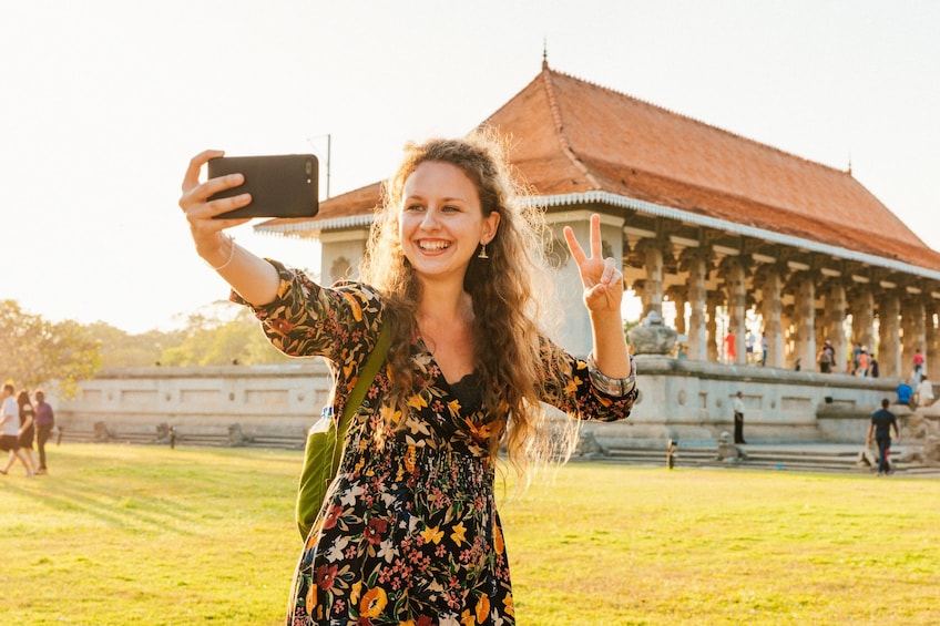Show item 1 of 9. Woman posing for a selfie in Colombo