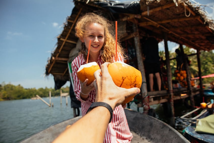 Coconut drinks on a boating tour in Galle