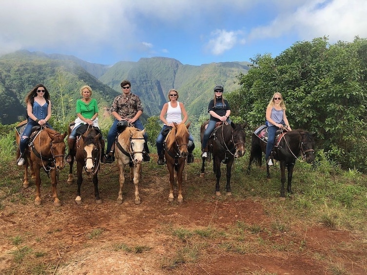 Horseback riders at a lookout in Waihle'e, Maui