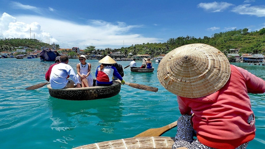Closeup of people in small round boats near Phu Quoc Island, Vietnam