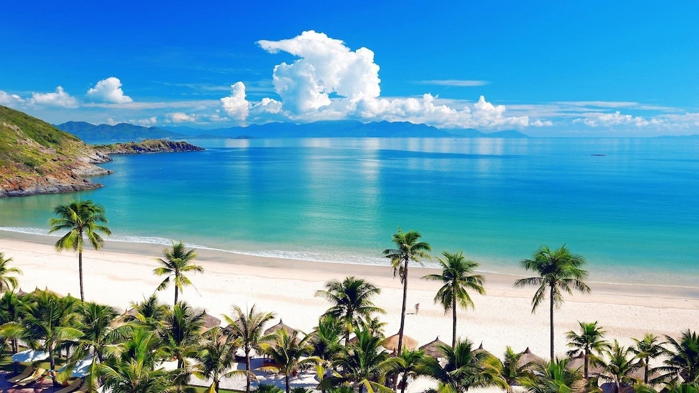 Bright blue ocean and white sand of Nha Trang Beach, Vietnam