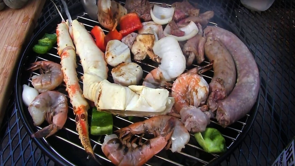 Seafood, meat and vegetables on a grill in Nha Trang