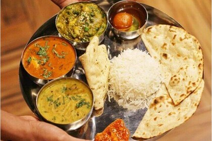 Cooking class & meal (Indian Food) with local family in Jaipur.