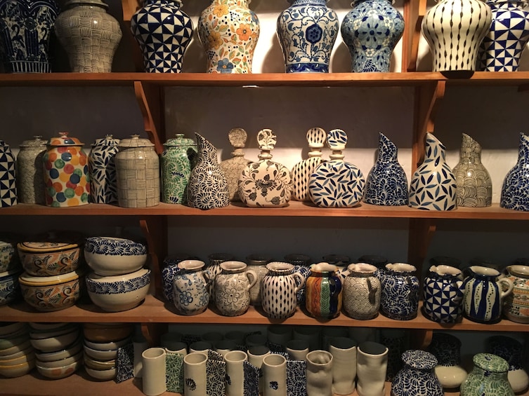 Jars and vases on a cabinet at a ceramics factories in Puebla